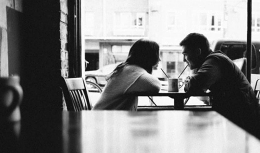 couple enjoying a drink together